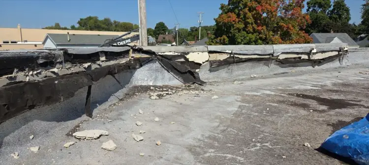 Devastating Commercial Flat Roof Problems (And How to Fix Them Before They Cripple Your Business)