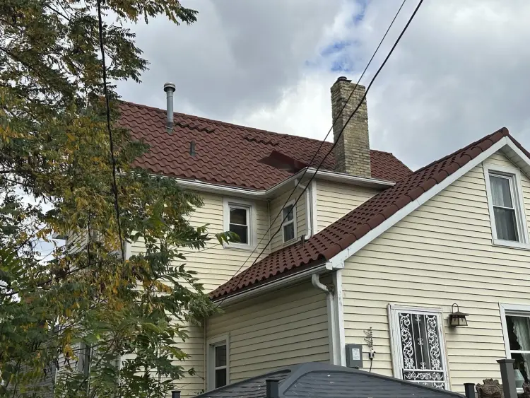 Decra metal shingle system resembling traditional asphalt