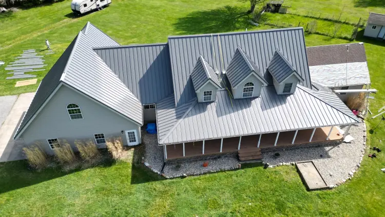 Hidden fastener metal roof with interlocking panels