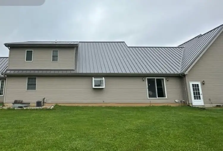 Metal roofing panel compared to traditional asphalt shingles